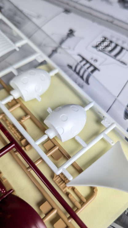 White and tan molded parts for the Oro Jackson model kit