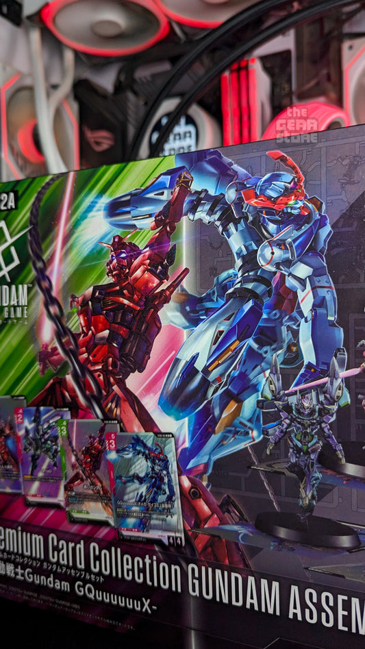 PC02A box art of GQuuuuuuX and the Red Gundam alongside four of the included Gundam Card Game cards