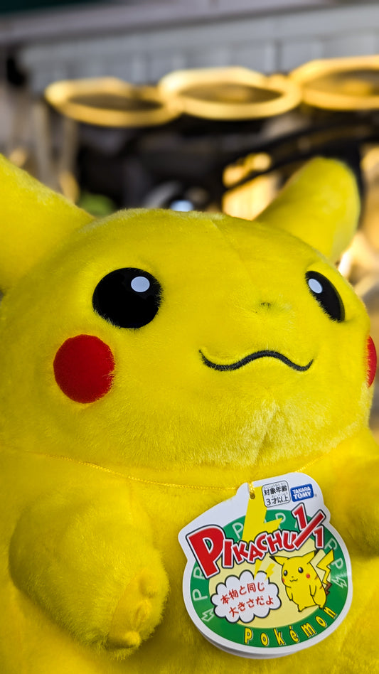 Takara Tomy Welcome Back! Pikachu 1/1 life-size plush with its Pikachu 1/1 hang tag