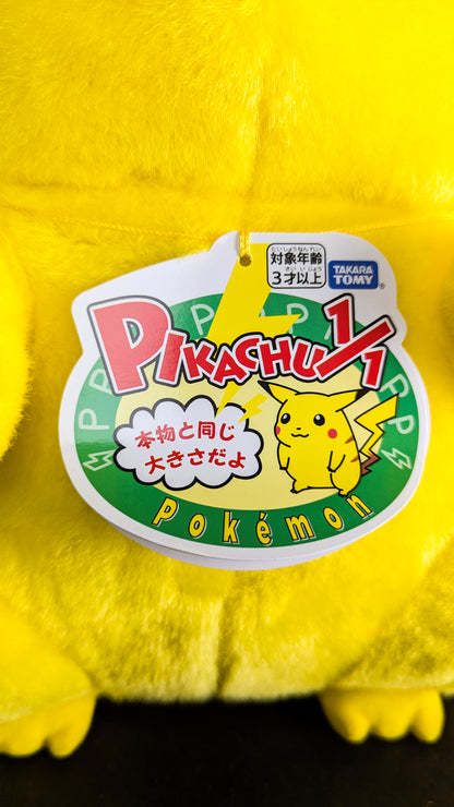 Takara Tomy Welcome Back! Pikachu 1/1 life-size plush with its Pikachu 1/1 hang tag
