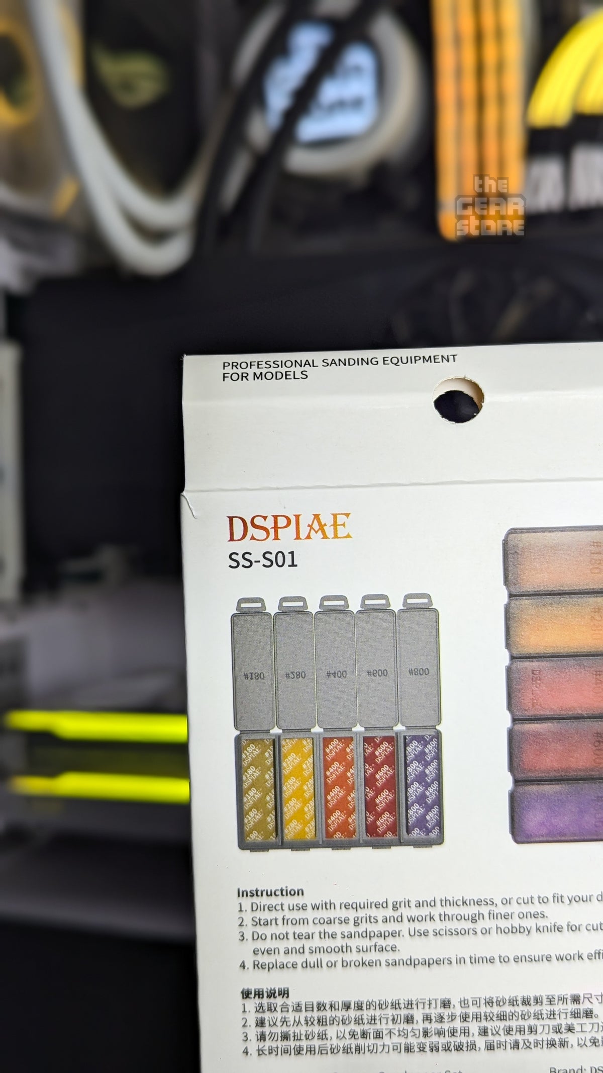 Back of the DSPIAE SS-S01 box showing the five-compartment grit case and usage instructions
