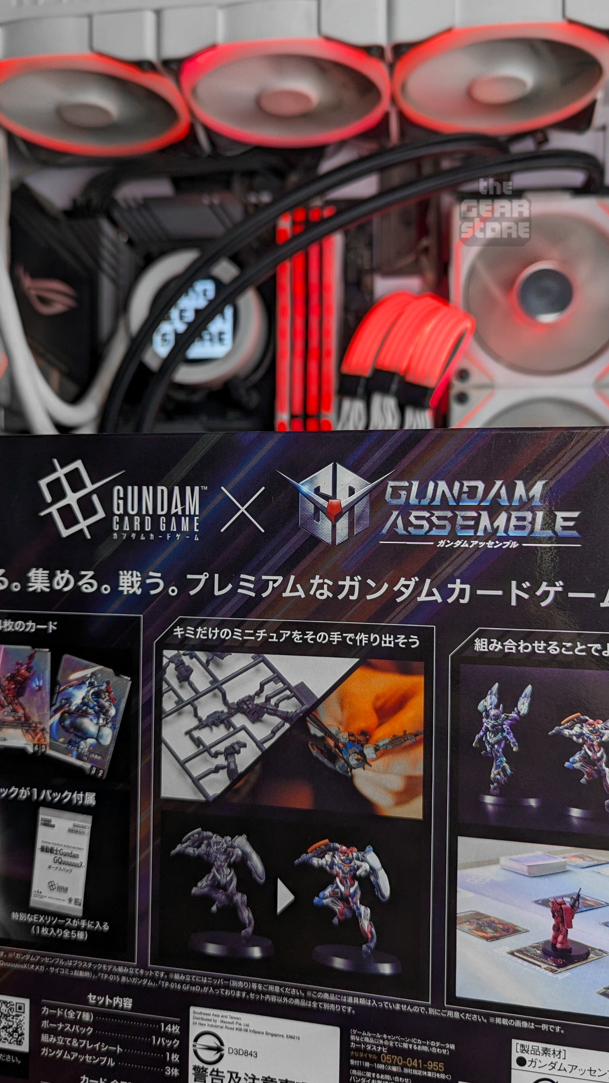Back of the PC02A box with the Gundam Card Game x Gundam Assemble logos and the set contents list