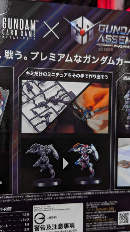PC02A box panel showing the Gundam Assemble runner, assembly, and an unpainted kit beside a painted one