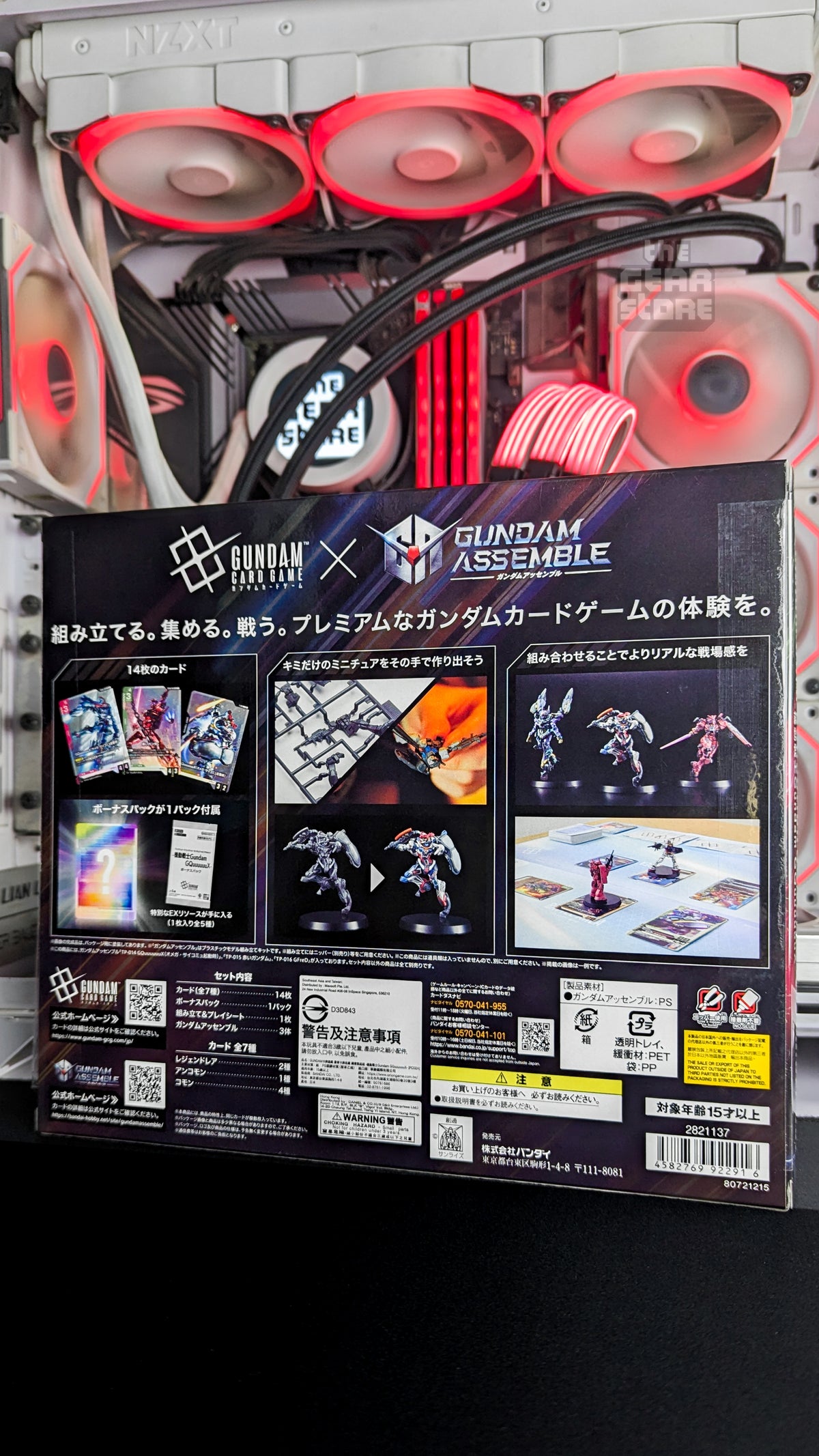 Back of the PC02A Gundam Assemble Set box showing the cards, bonus pack, build steps and set contents